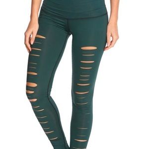 Medium Green Teeki Leggings with cutouts in front. Like new!
